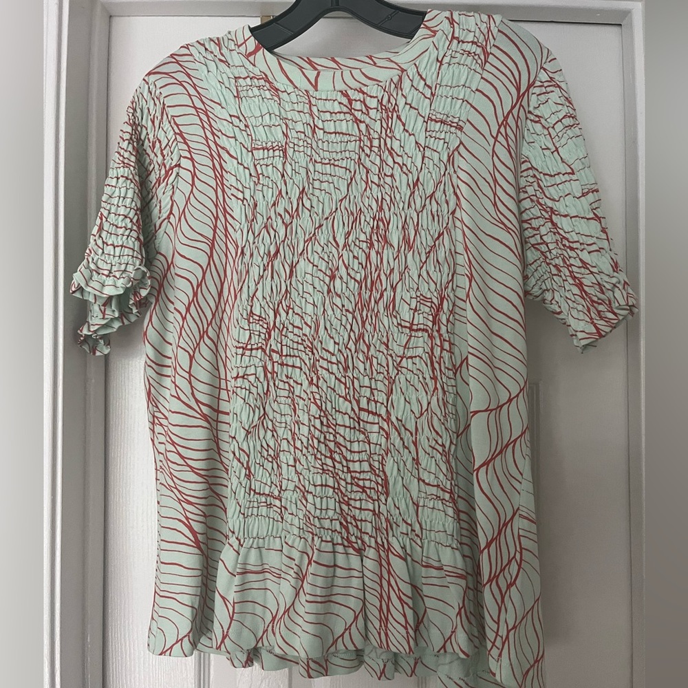 Smocked detail printed tee shirt. New never worn without tags